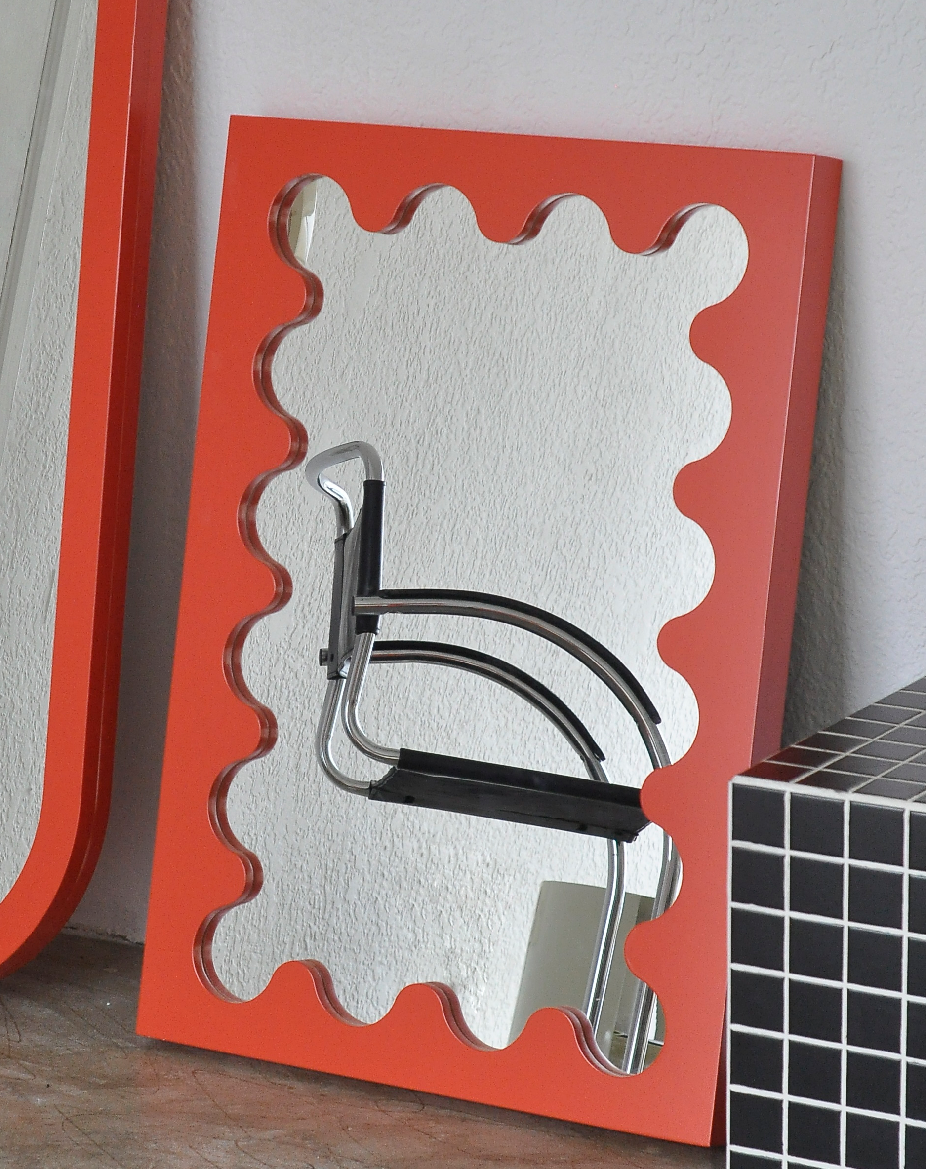 E01 — espejo curvy